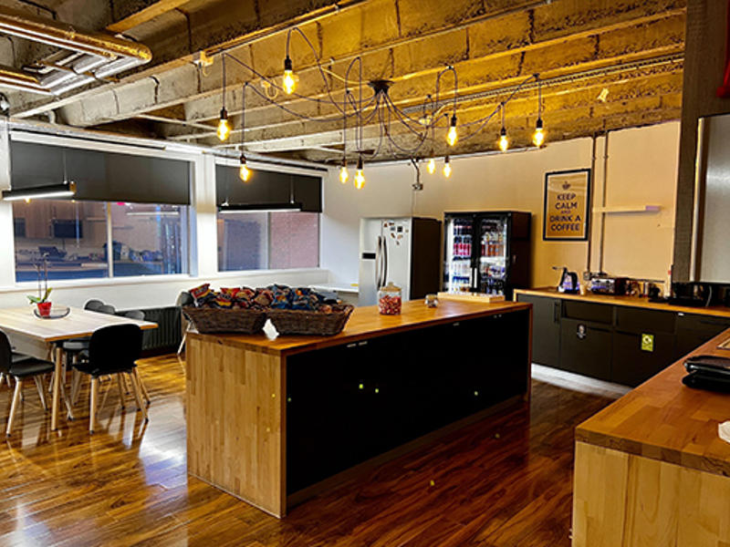 a room with a wood floor and a wood counter