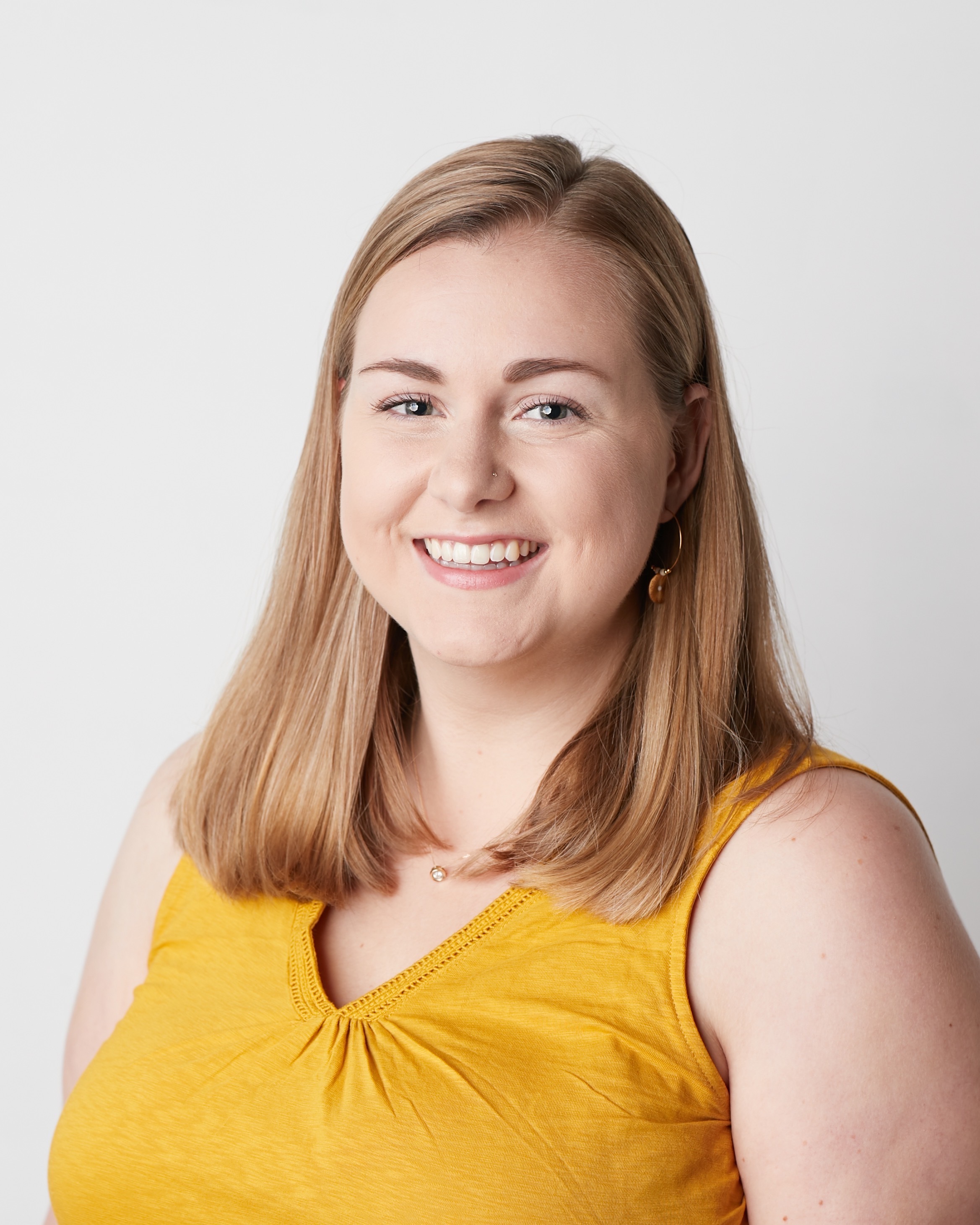 a person smiling at camera