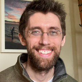 a person smiling at the camera