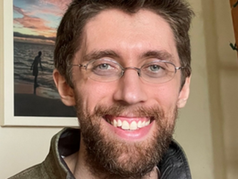 a person smiling at the camera