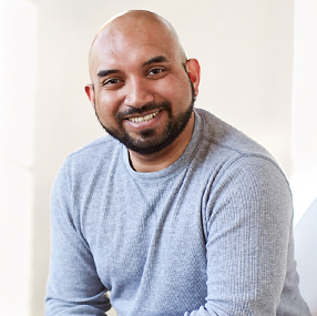 a person smiling at the camera