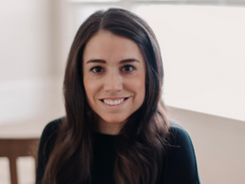 a person smiling at camera