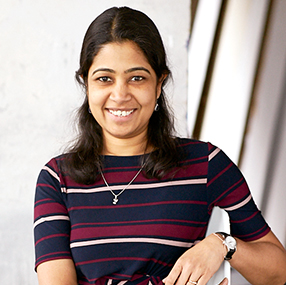 a person smiling at the camera