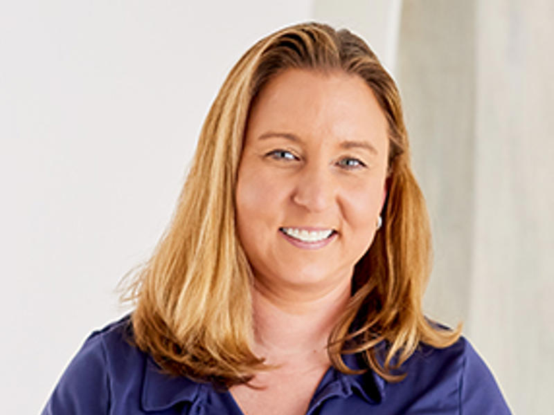 a person smiling at camera