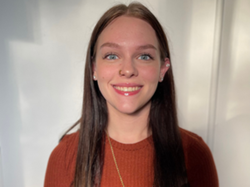 a person smiling at camera
