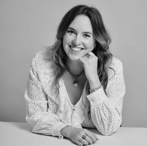 a person smiling at camera