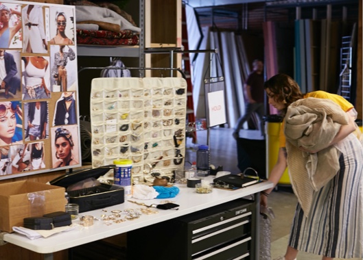 a person standing next to a table