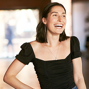 a person laughing in a room