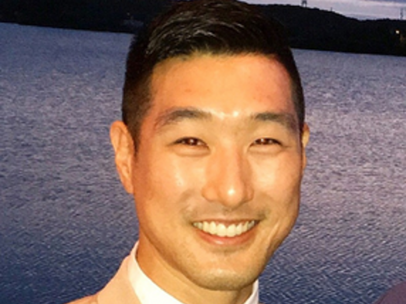 a person smiling at the camera